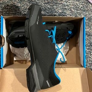 Never worn - bought wrong size. Compatible w/ both cleat types